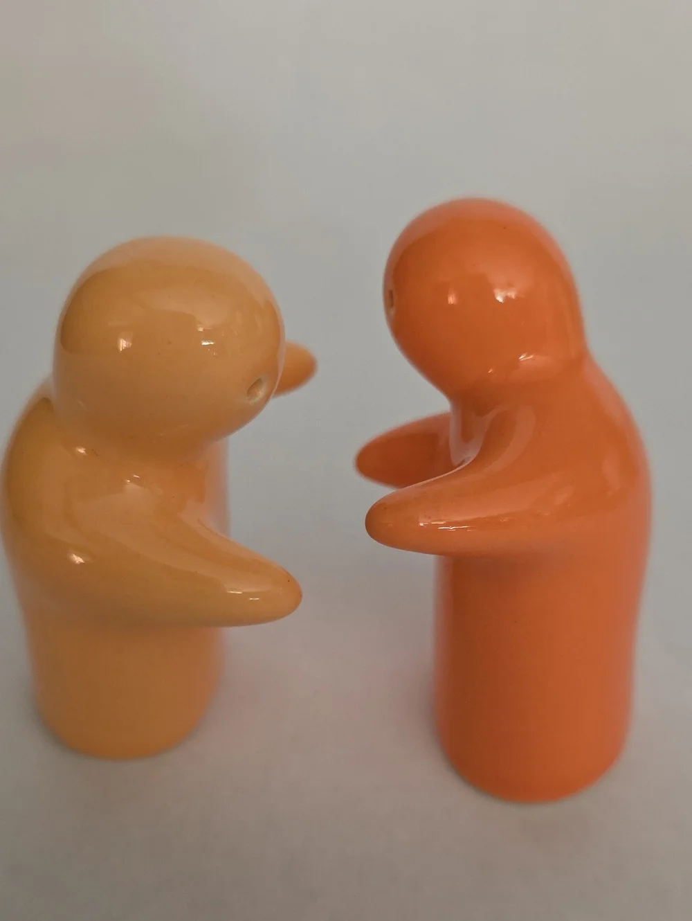 Vintage Hugging Glossy Ceramic Ghosts Salt & Pepper Shakers Pair - Orange Duo